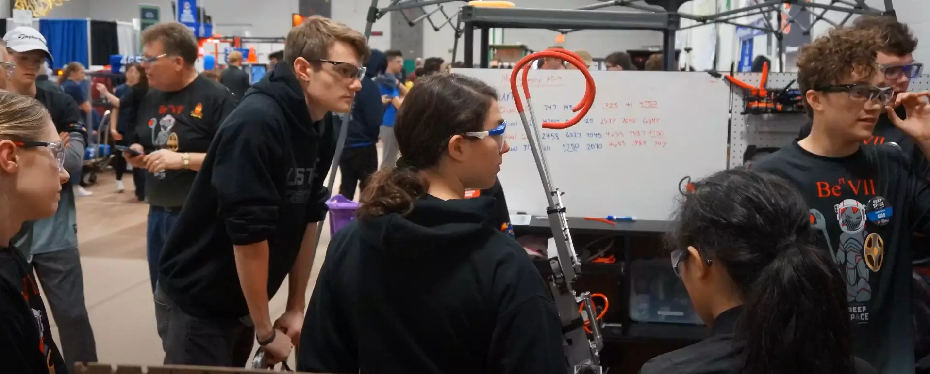 My team and me standing around one of our robots